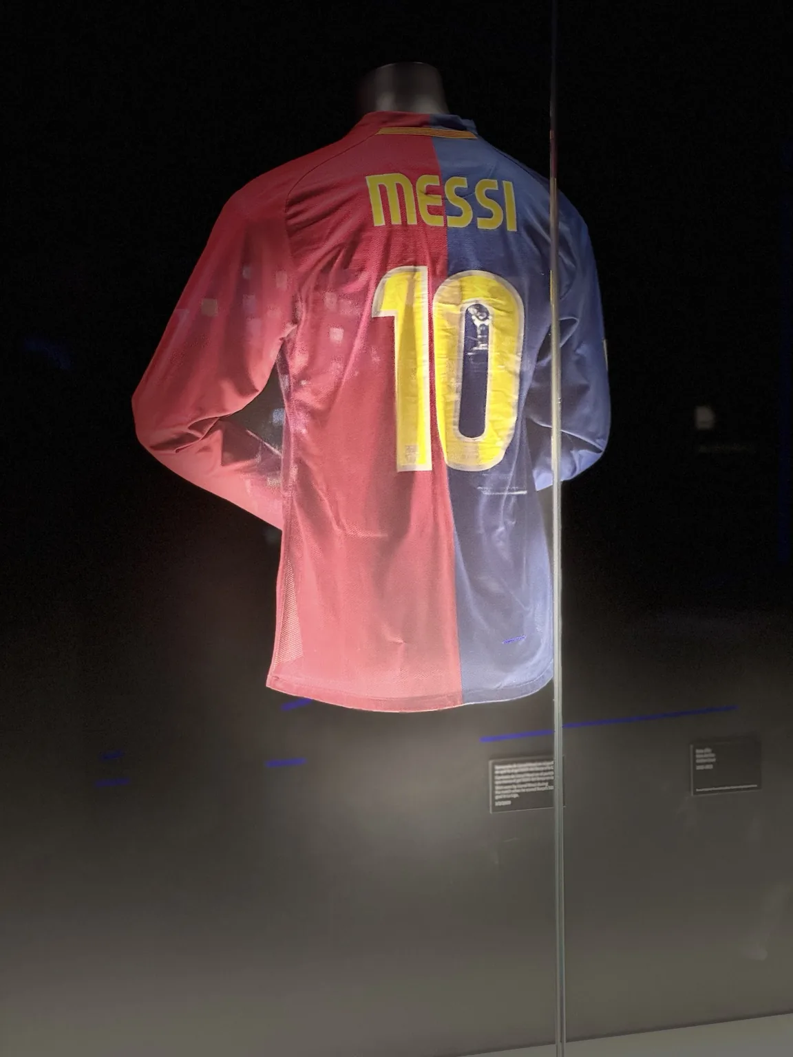 A Messi number 10 shirt on display.